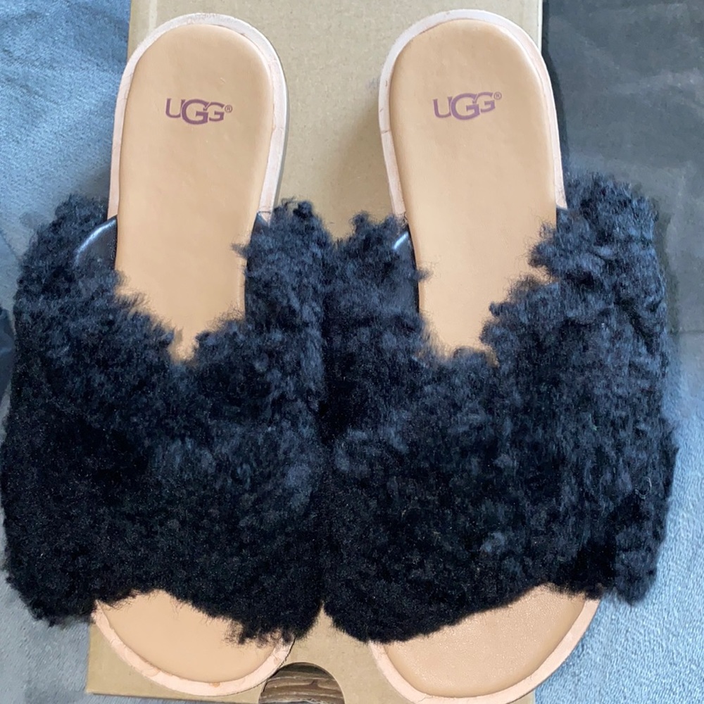 Ugg’s black furry slides